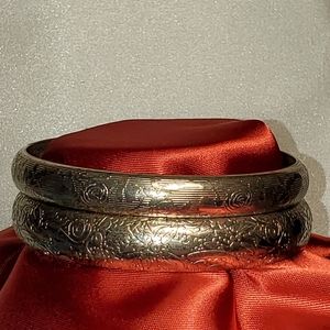 2 silver toned bangle bracelets